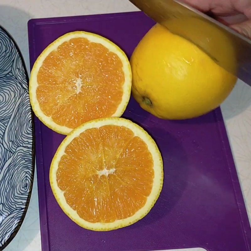 Bước 2 Vắt lấy nước cam tươi Nước cam mật ong