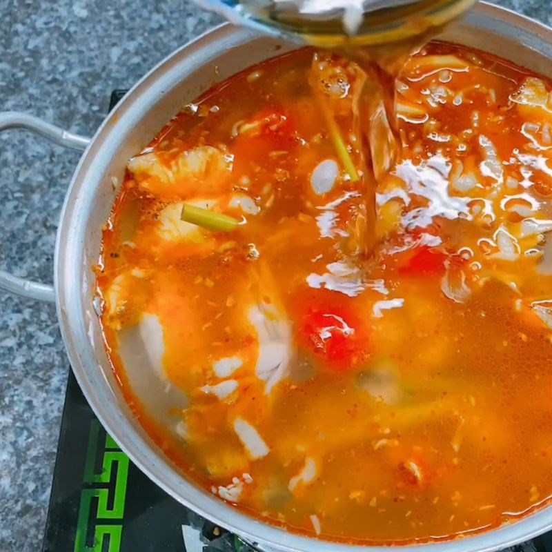 Bước 3 Nêm nếm gia vị cho nước lẩu Lẩu ếch chua cay