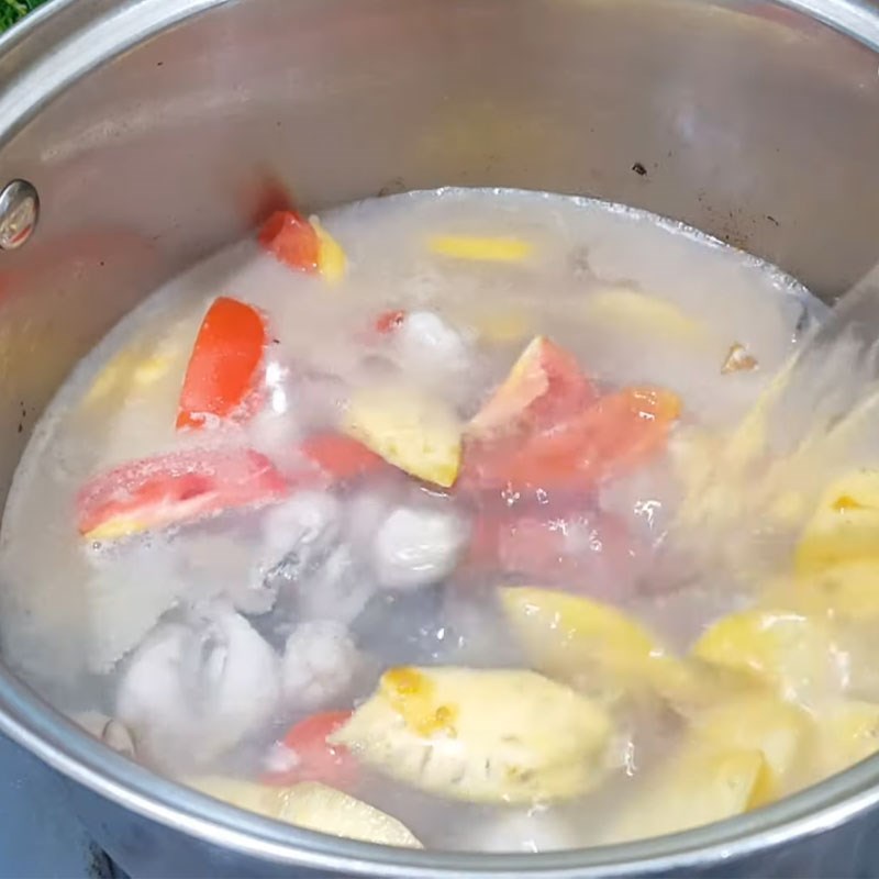 Bước 3 Thêm cà chua, dứa và đun canh chua canh chua hàu sữa