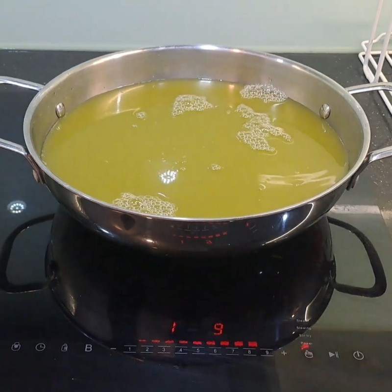 Bước 1 Đun sôi nước mía Đường mía thô