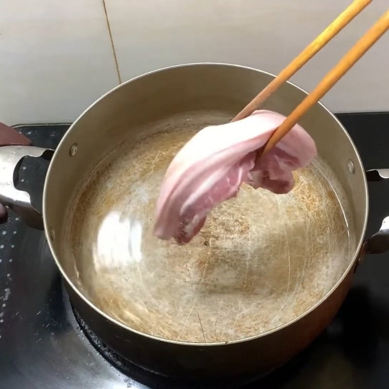 Bước 1 Luộc thịt ba chỉ thơm ngon Nộm bí xanh