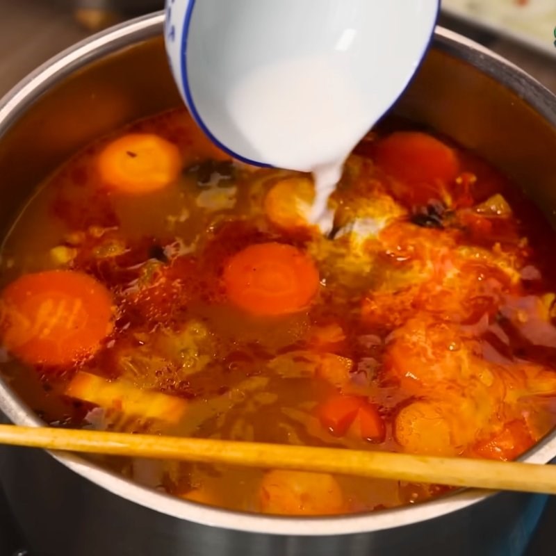 Bước 5 Thêm cà rốt và nước dừa Cách nấu bò kho truyền thống