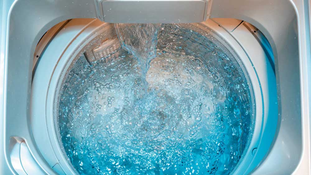 Máy giặt xả nước trong quá trình vắt