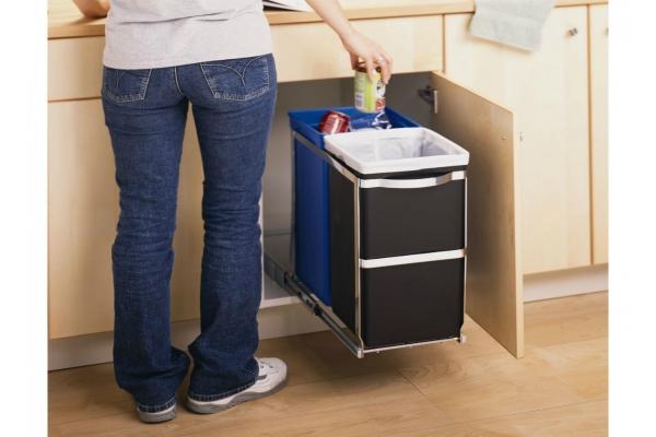 Putting trash in the right place helps keep the kitchen tidy