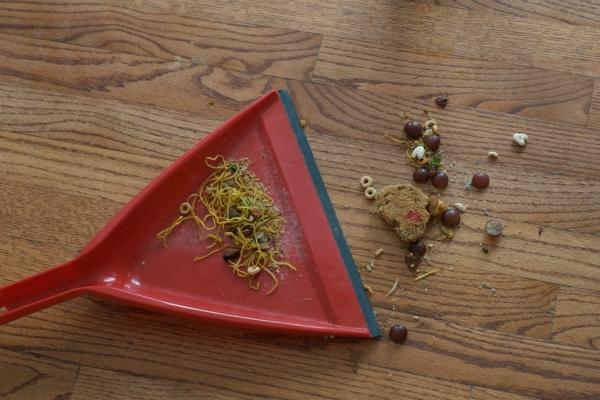 Clean up food that falls on the floor while cooking