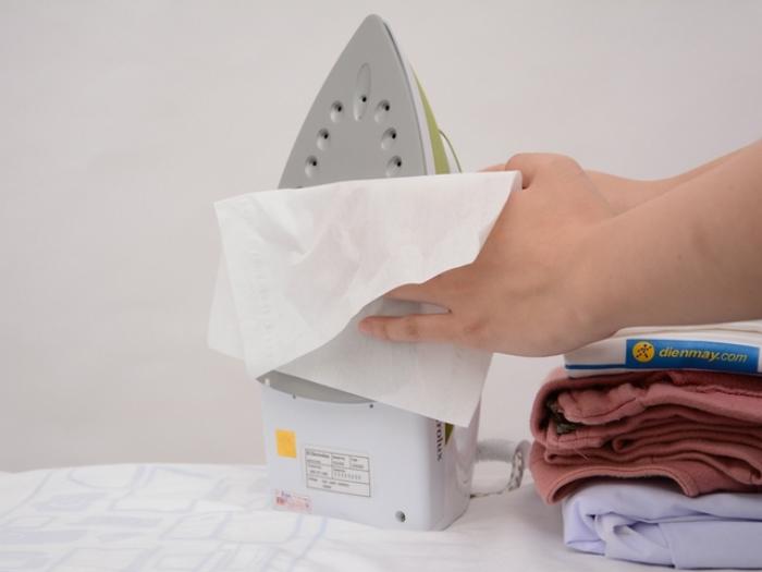 Use a damp cloth to clean the iron regularly