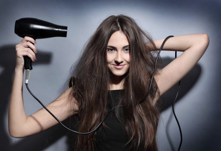 Position the hairdryer nozzle about 15cm away from the scalp to avoid hair damage