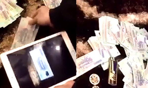 Nam thanh niên rút tiền từ iPad