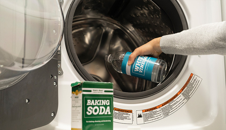 Use a mixture of baking soda and water to clean the washing drum