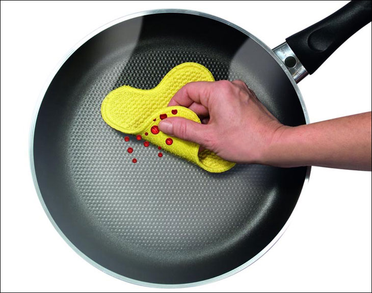 Apply a layer of cooking oil to the non-stick layer before storing