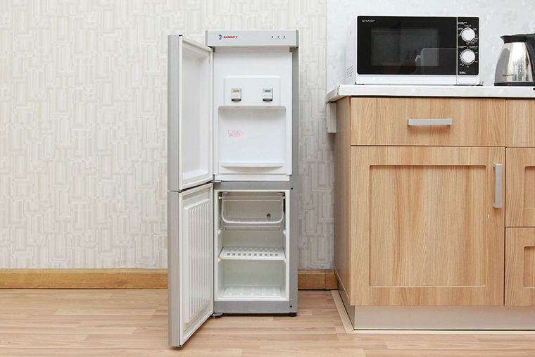 A block-cooled water dispenser with a cool compartment, elegant design