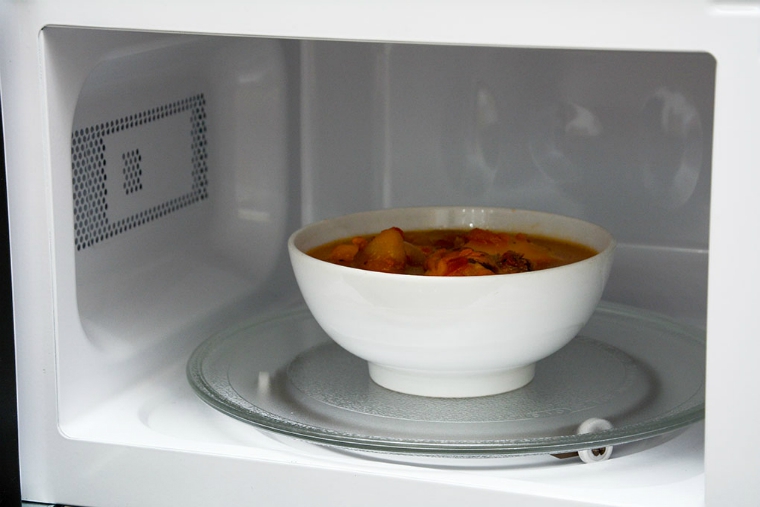 Heat food in the microwave