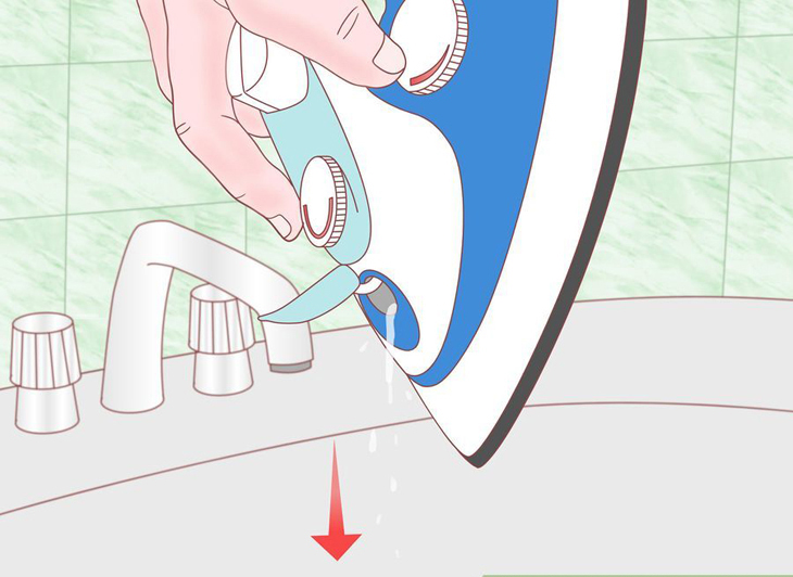 Hướng dẫn cách ủi khô bằng bàn ủi hơi nước > Đổ nước khỏi bình chứa của bàn ủi