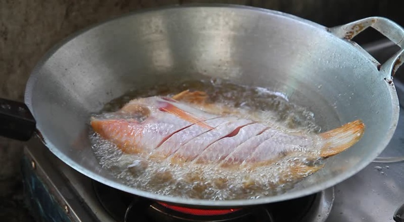 Fry the fish before cooking