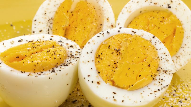 Not soaking eggs in cold water immediately after boiling