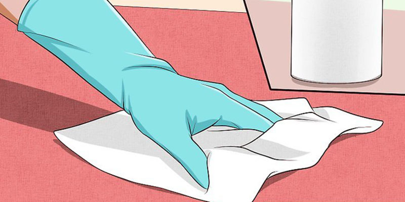 Dùng vải hoặc giấy để thấm sạch hết dung dịch giấm. 
