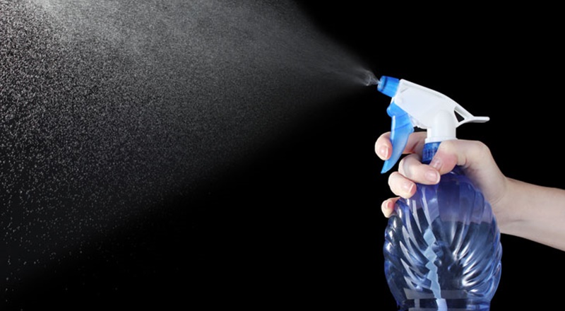 Spraying detergent solution