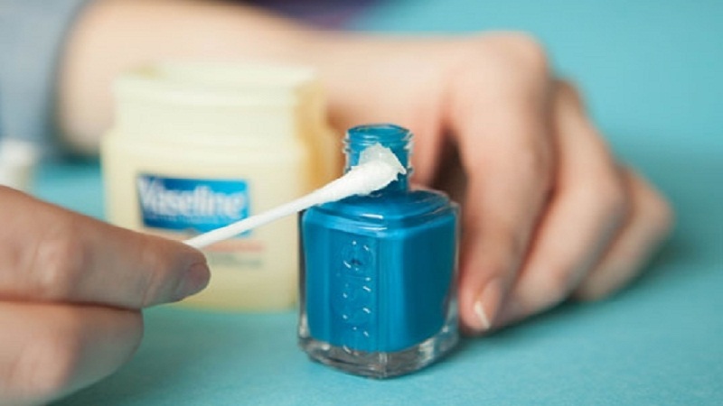 Apply Vaseline around the mouth of the nail polish bottle
