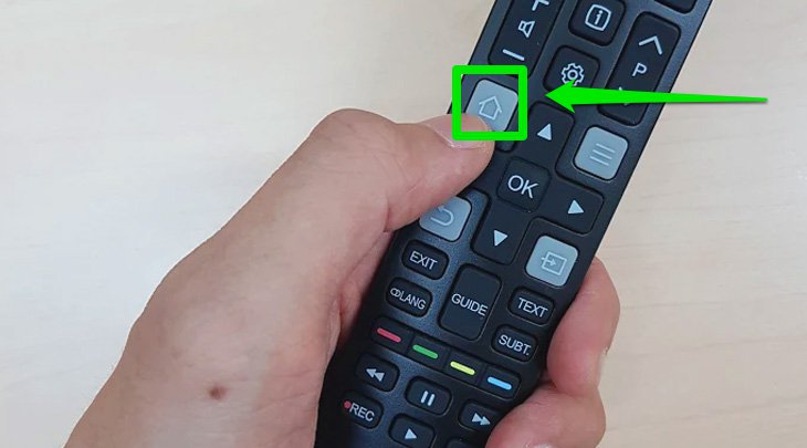 Nhấn nút Home trên remote tivi