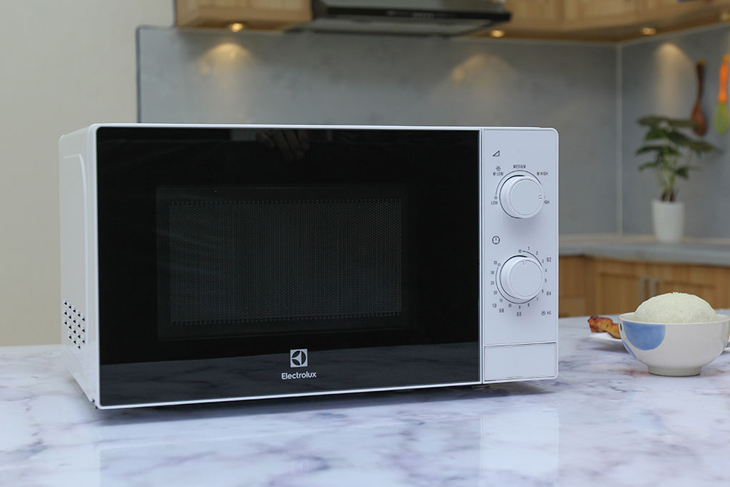 Place the microwave in a dry and ventilated position in the kitchen