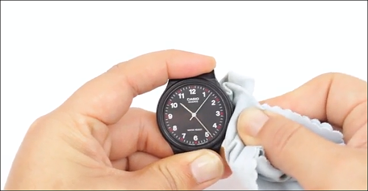 Use a soft cloth dipped in the mixture to clean the area around the watch face