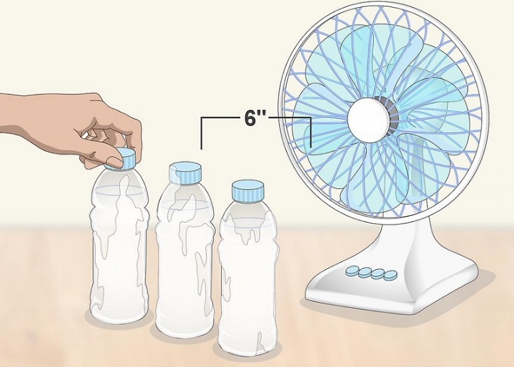 place ice water bottles in front of the fan