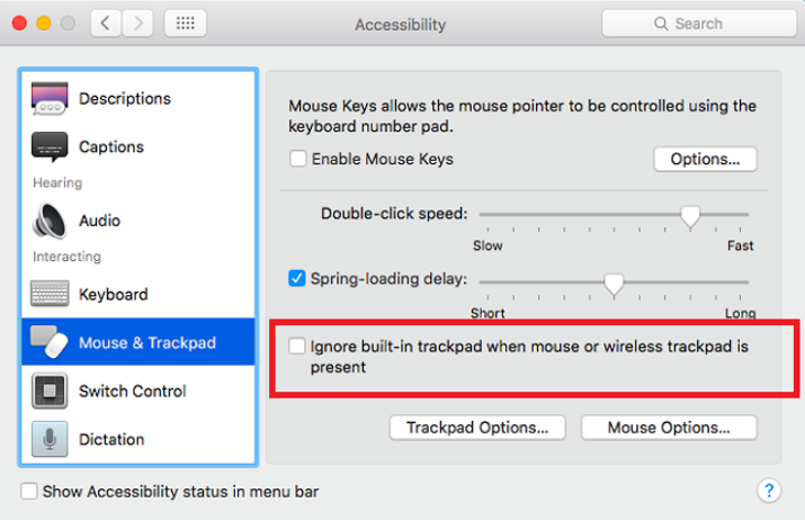 Xóa đi dấu tích trên ô Ignore built-in trackpad when mouse or wireless trackpad is present.