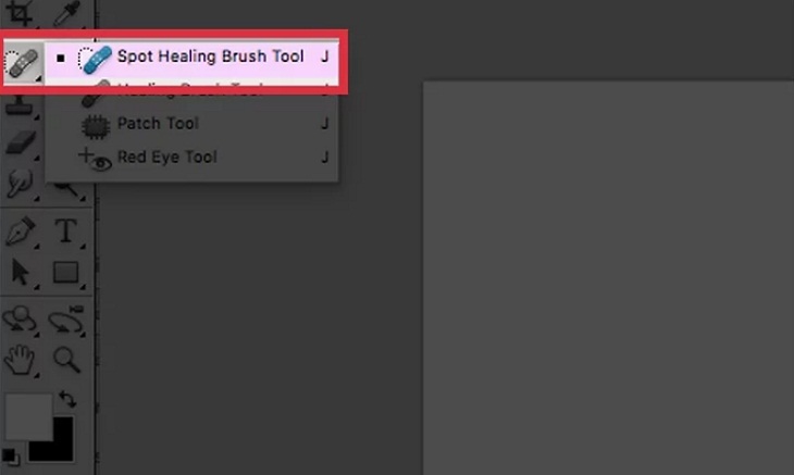 Chọn công cụ “Spot Healing Brush Tool”