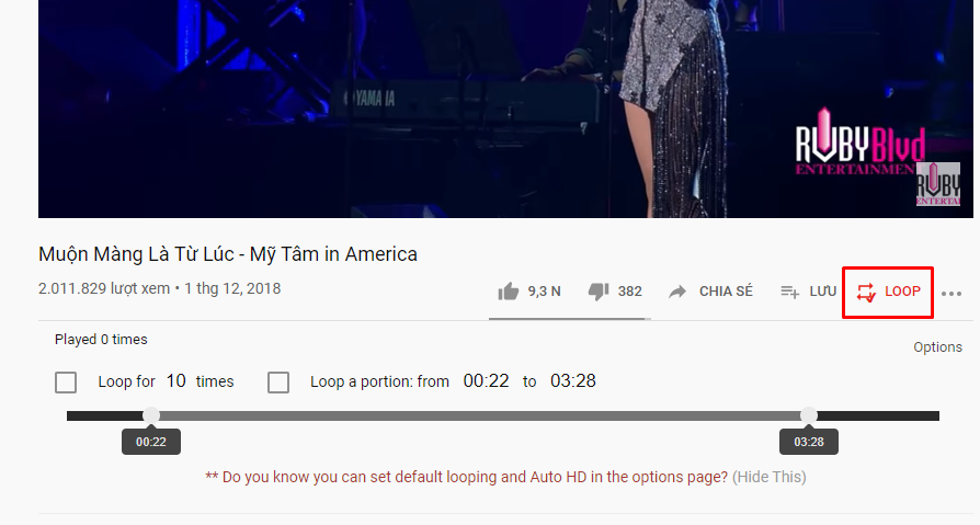 Bạn mở video muốn xem, bên dưới video sẽ xuất hiện thêm biểu tượng Loop. Chúng ta chỉ cần nhấn vào đó để lặp lại video mà thôi.