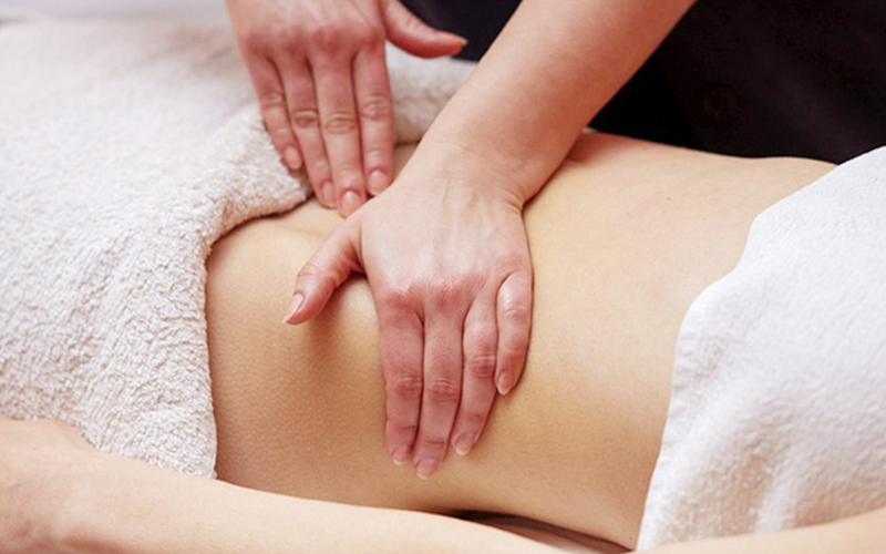 massage bằng dầu dừa