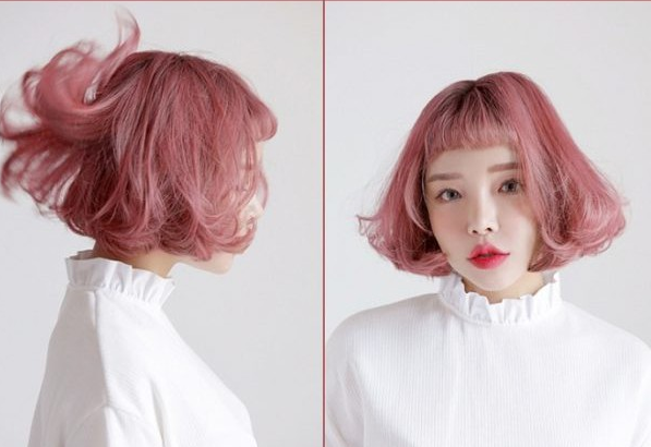 Nhuộm tóc màu hồng đào là sự kết hợp tinh tế giữa màu hồng tươi và màu cam gạch. Đây là sự lựa chọn hoàn hảo cho những người yêu thích phong cách nhẹ nhàng và tinh tế.