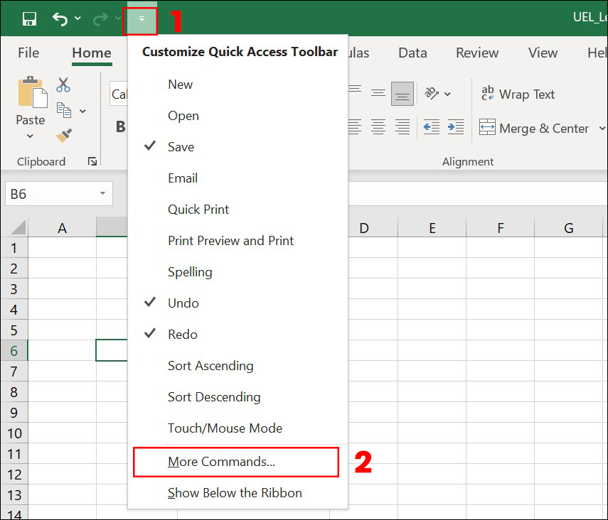 Chọn vào mũi tên xuống cạnh Quick Access Toolbar > Chọn More Commands