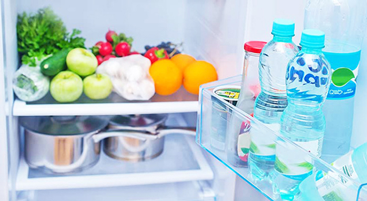 Add some water bottles to the refrigerator