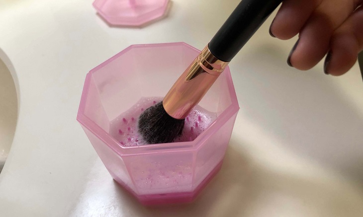 Step 2: Pour the makeup brush cleaning solution into your hand or into a small box