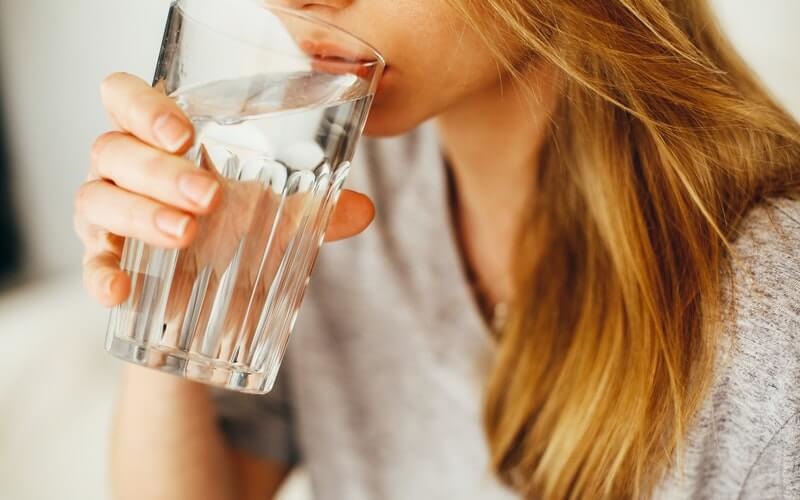 Drink warm water before and after foot soaking