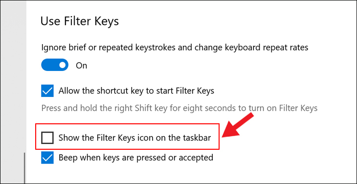 Trượt xuống ở ô Show the Filter keys icon on the taskbar chuyển sang trạng thái không hiển thị dấu tích