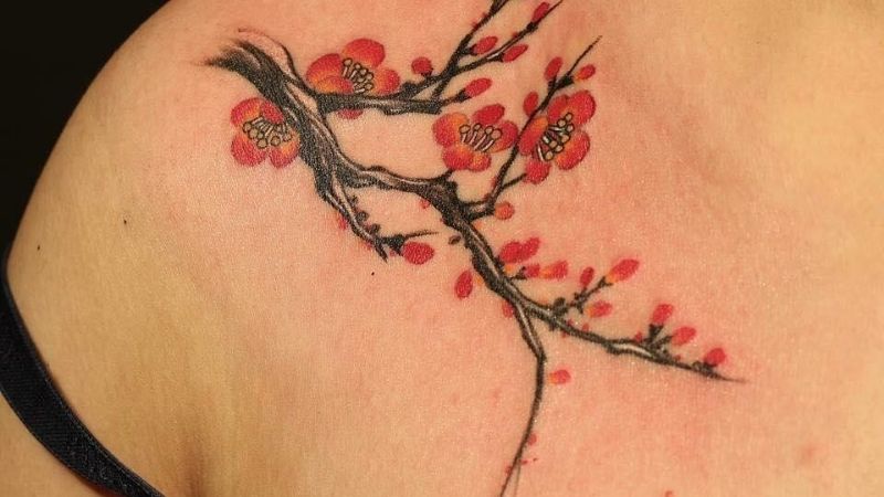Female tattoo of red rice flower with flower branch is extremely fresh and full of vitality.