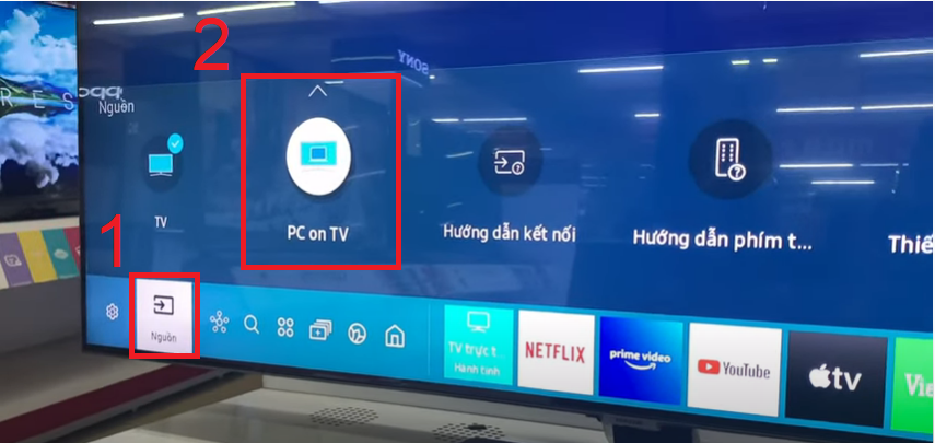 Bấm nút mũi tên sang phải để đến phần Nguồn (SOURCE), sau đó chọn PC on TV.