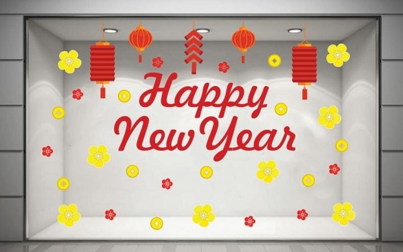 Trang trí cửa kính với decal Happy New Year và hoa mai vàng