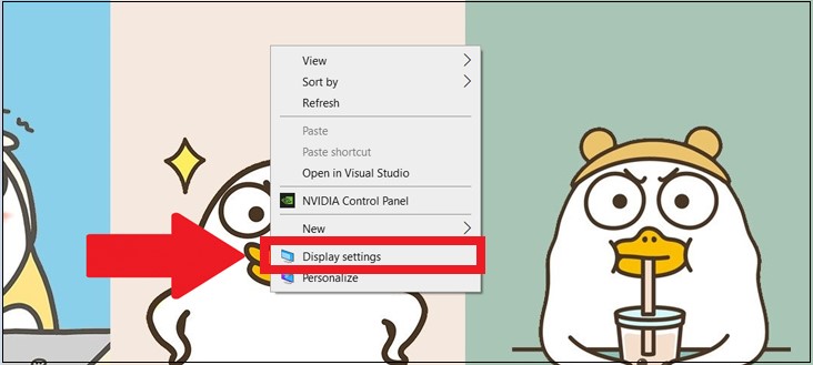 Bạn hãy click chuột phải vào chỗ trống trên màn hình desktop và chọn Display settings