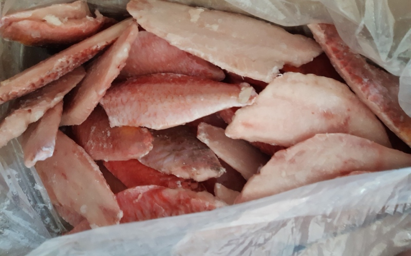 Purchase red snapper from bustling seafood markets