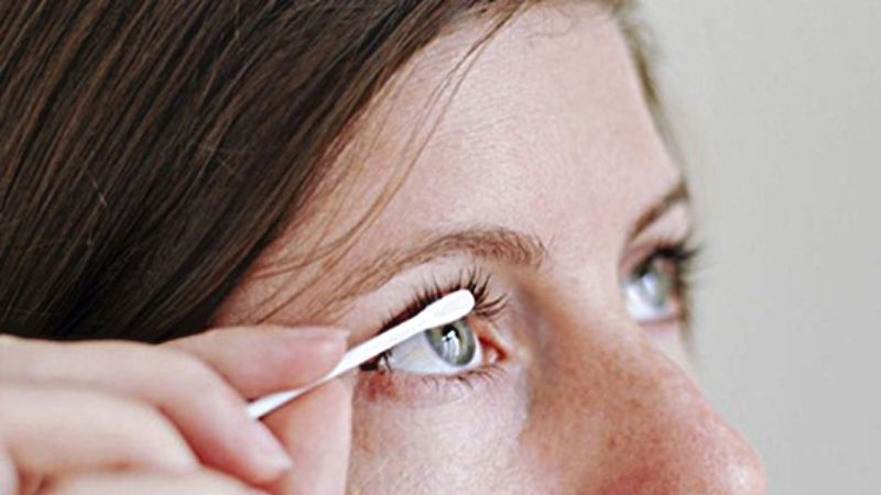 Curl lashes with cotton swab
