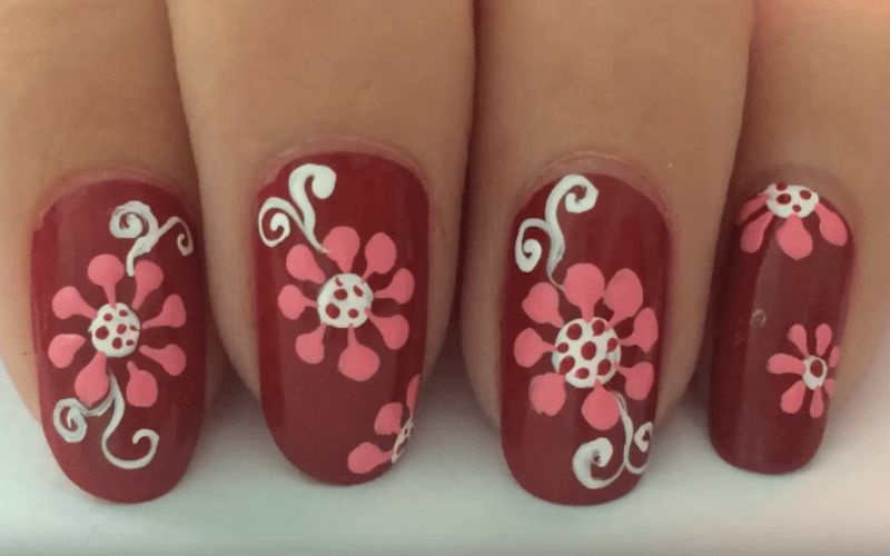 Mẫu nail hồng vẽ hoa phượng