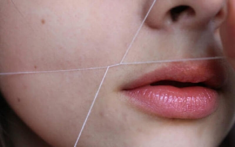 Removing lip hair with thread is an easy and natural way to remove hair