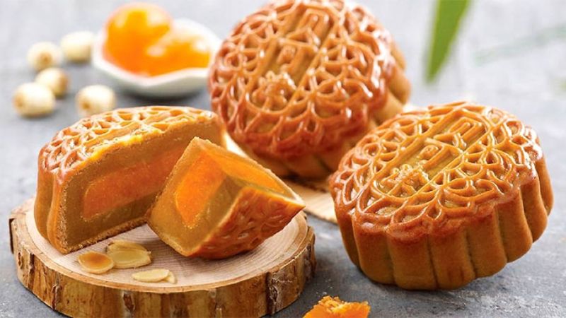 Moon cake filled with green beans, durian and salted egg