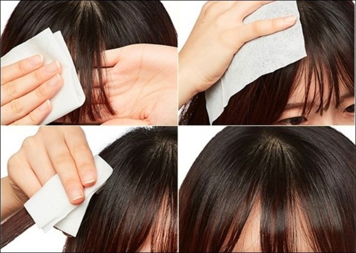 Thấm khô tóc bằng khăn giấy trước khi sấy 