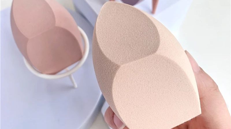Makeup sponge with two indented parts