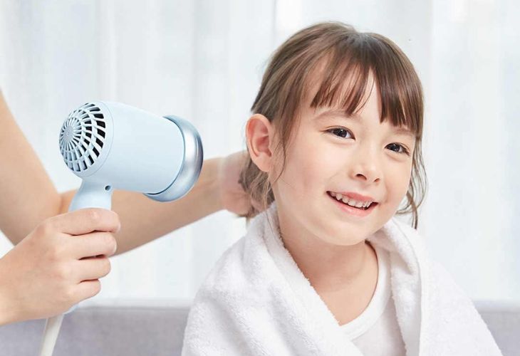 Maintain a safe distance when drying hair