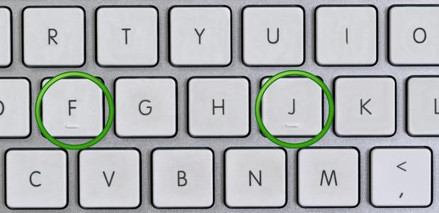 The dot located on the number 5 key next to the number key cluster helps to position the middle finger at position 5 when manipulating.
