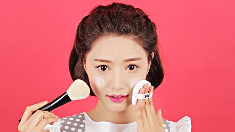 Dust powder evenly on face